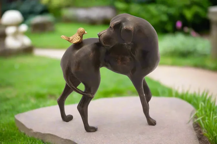 Dog and Bird Sculpture