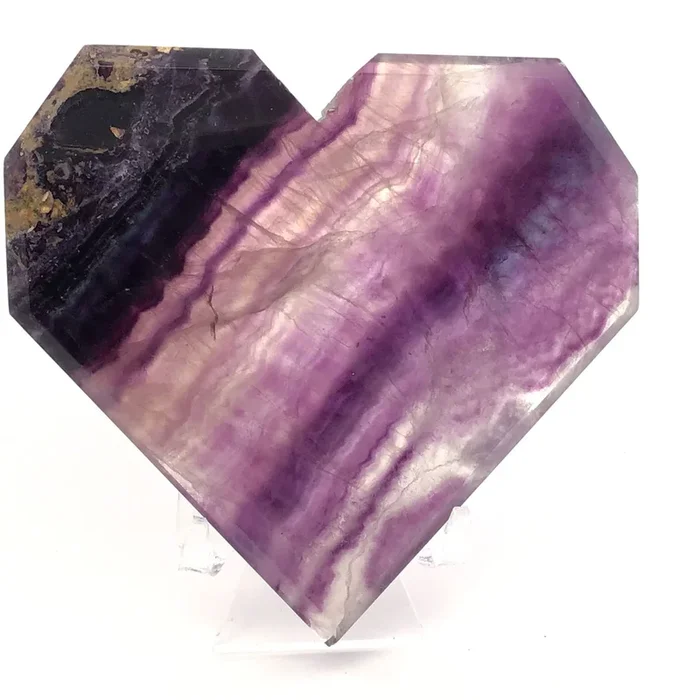 Rainbow Fluorite Heart – Flat With Faceted Faces On Lucite Stand (Diagonal Purple Banding & Tan Included Matrix On Curved Edge)